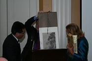 Yuanmu Yu, Haiqing Zhang & Jan Drago exchanging gifts
